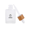 30ml quadratische, flache Glas-Kosmetikflasche mit Tropfflasche und Bambuskappe